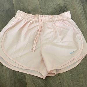Light baby pink Nike Dri-fit athletic running exercise shorts